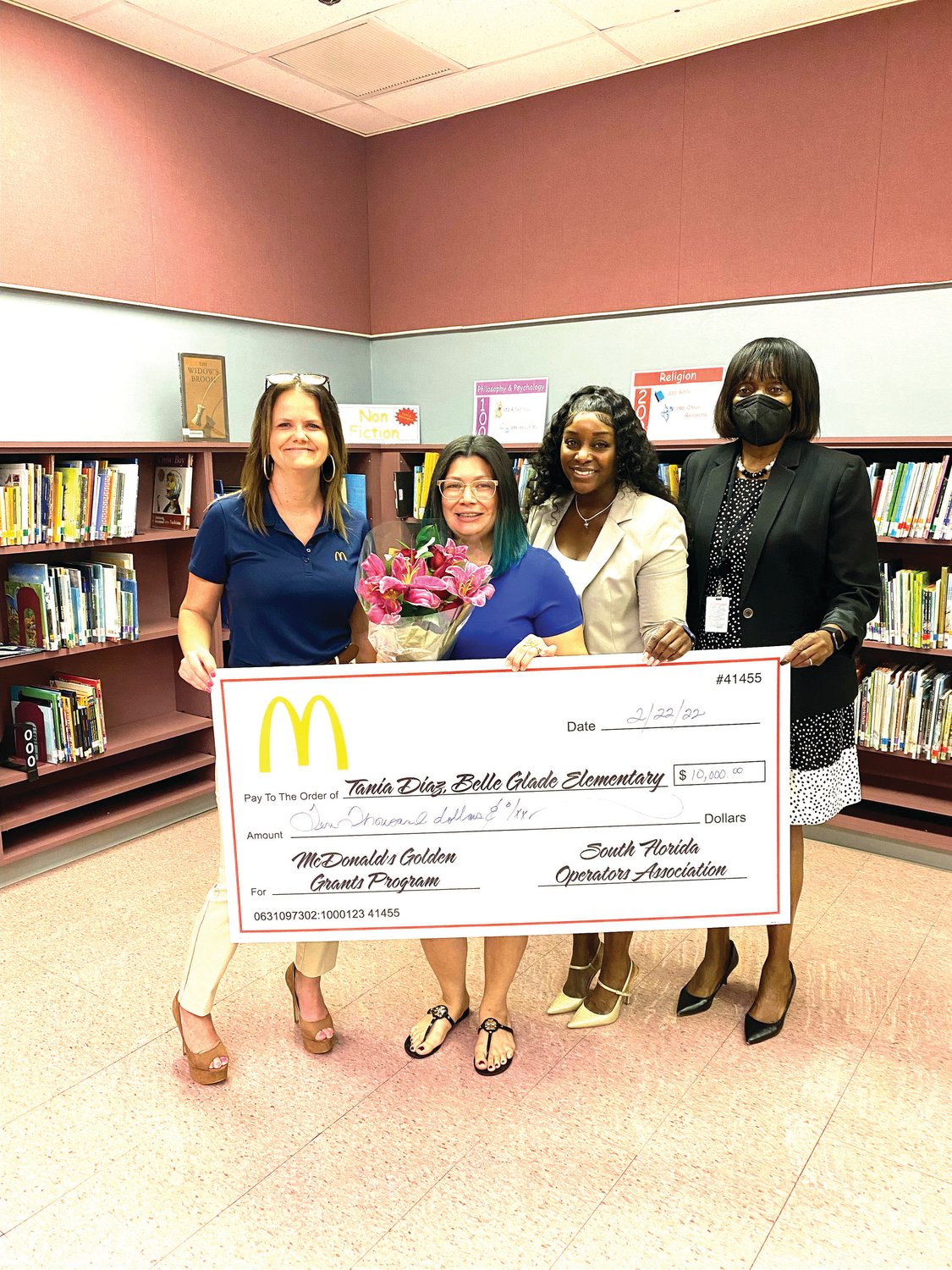 Ms. Diaz, accepted the grand prize award of $10,000 from local McDonald’s owner, Amanda Nisbet.